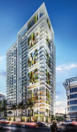 Modern high-rise building with illuminated windows.