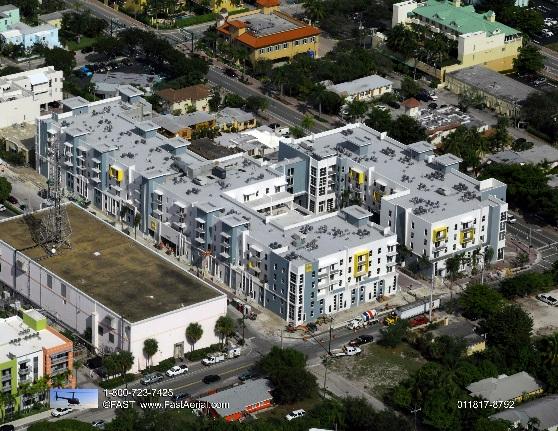 Aerial view of modern apartment complex.