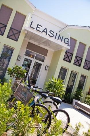 Leasing office exterior with parked bicycle.