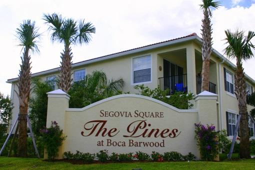 Apartment building with Segovia Square sign.