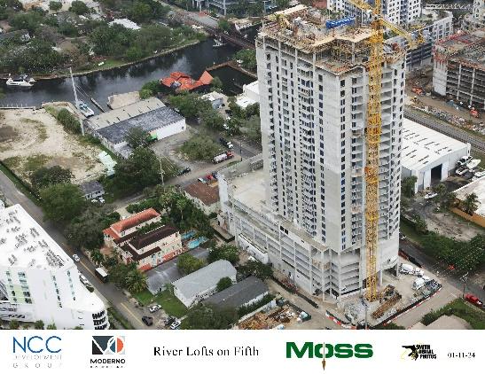 High-rise building under construction, aerial view.