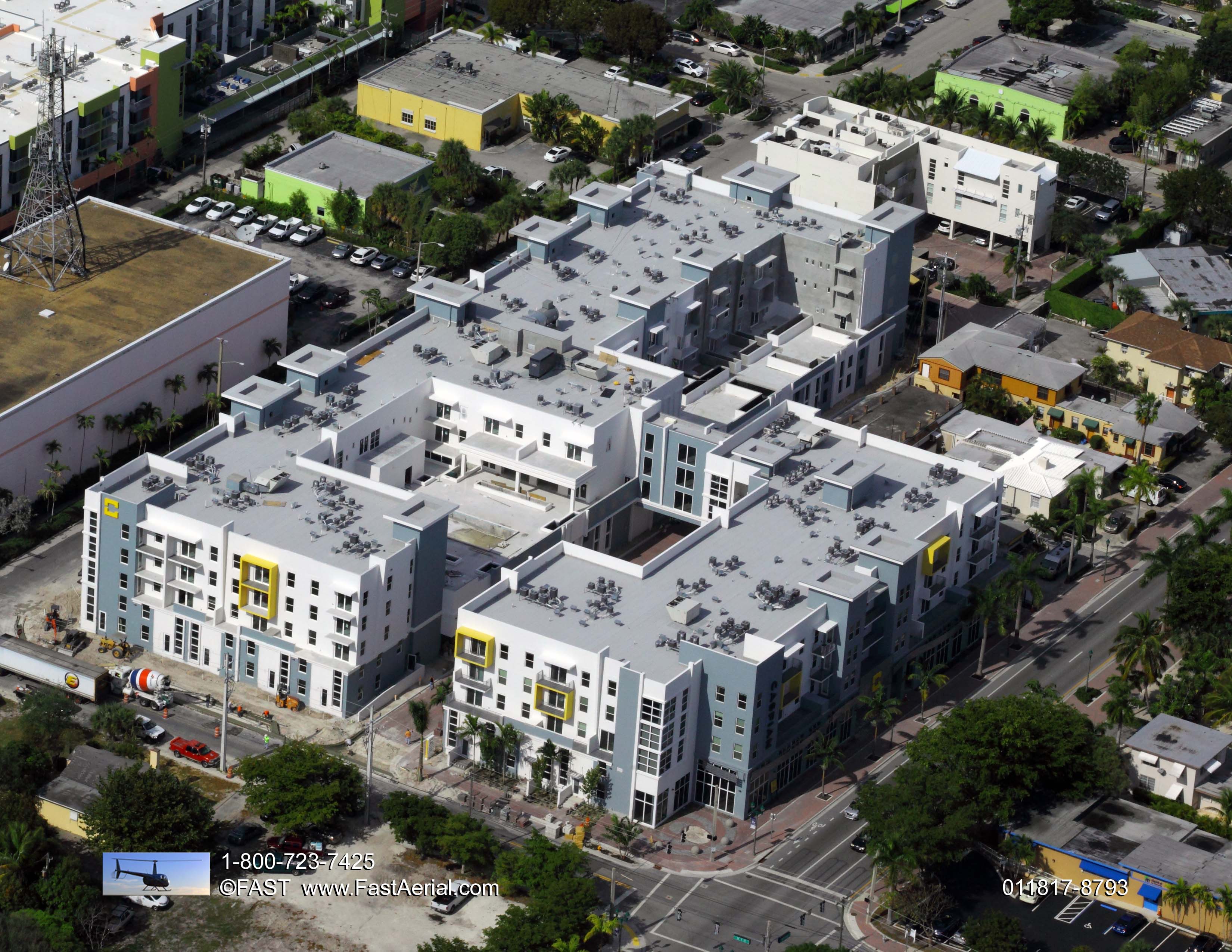 Aerial view of modern apartment complex in an urban area.