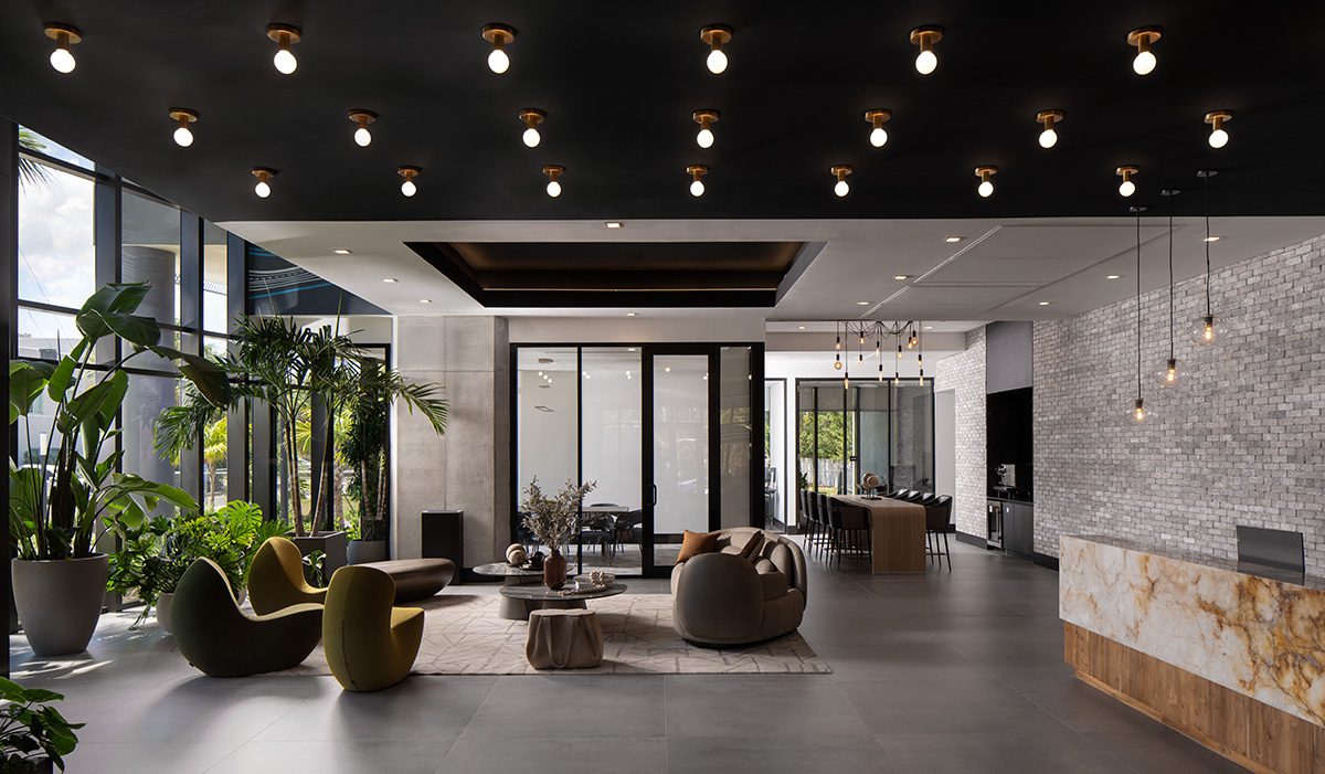 Modern living room with stylish furniture and unique lighting.