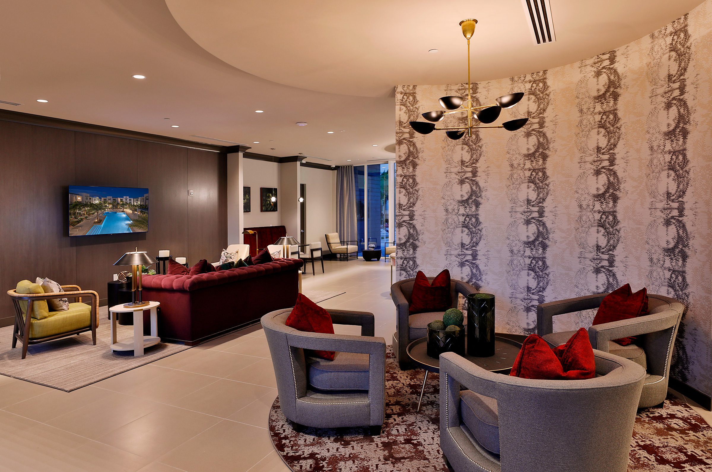 Luxurious living room with modern furniture and elegant lighting.