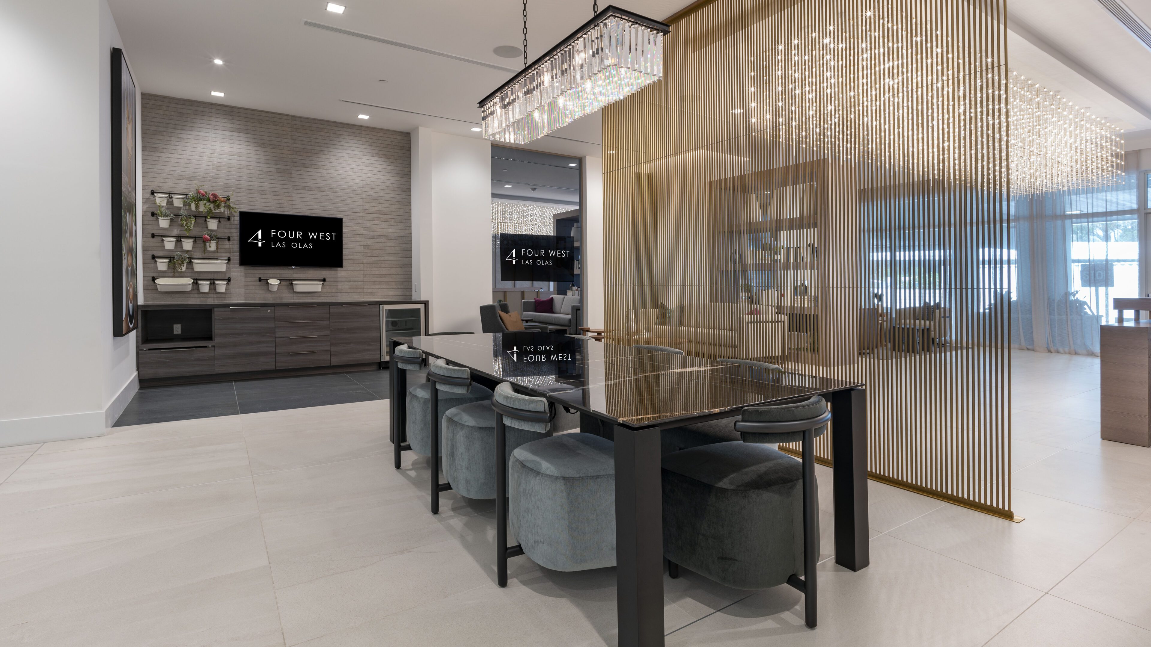 Modern dining area with elegant lighting and comfortable seating.