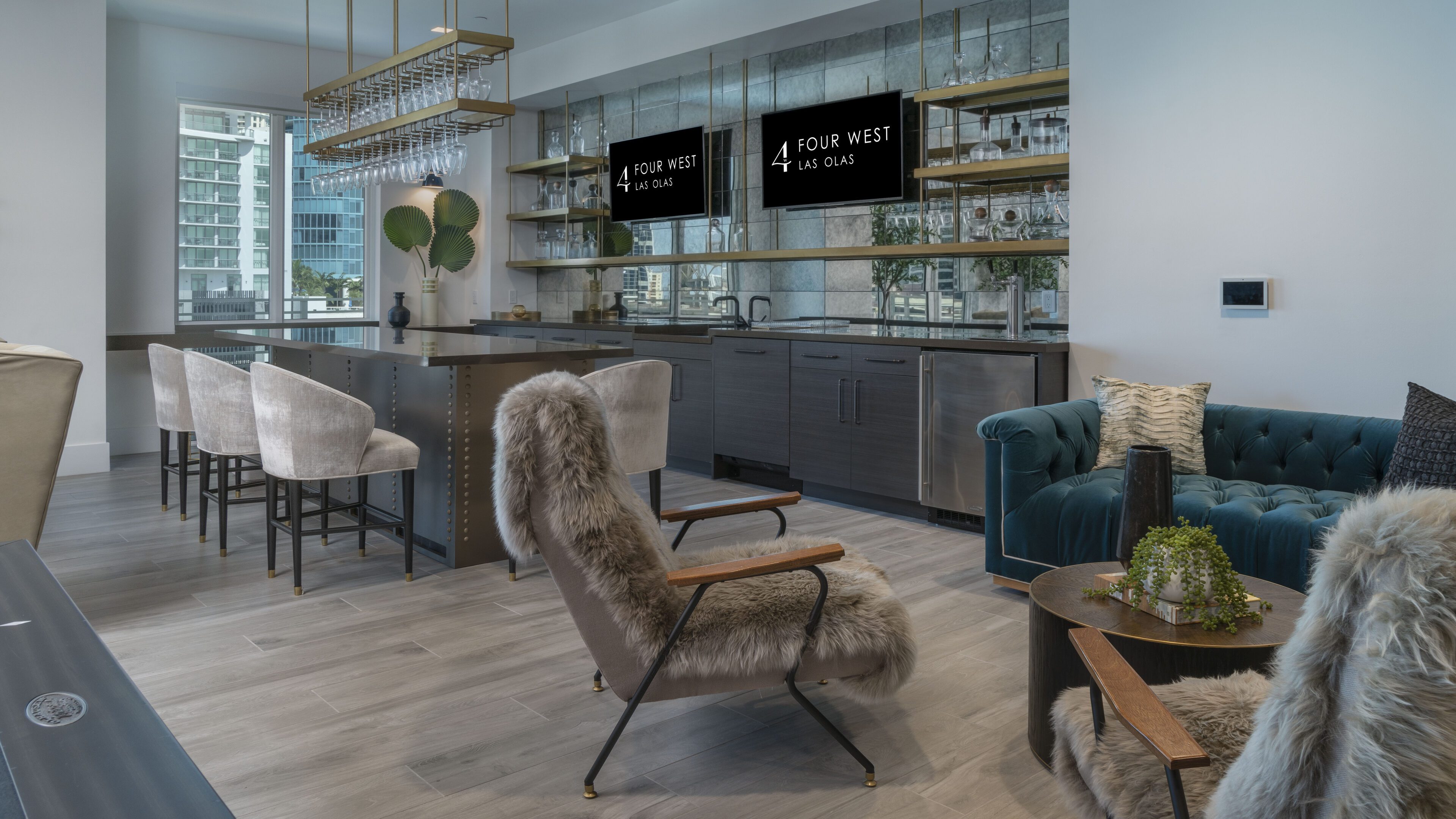 Cozy modern lounge with plush seating and sleek cabinetry.