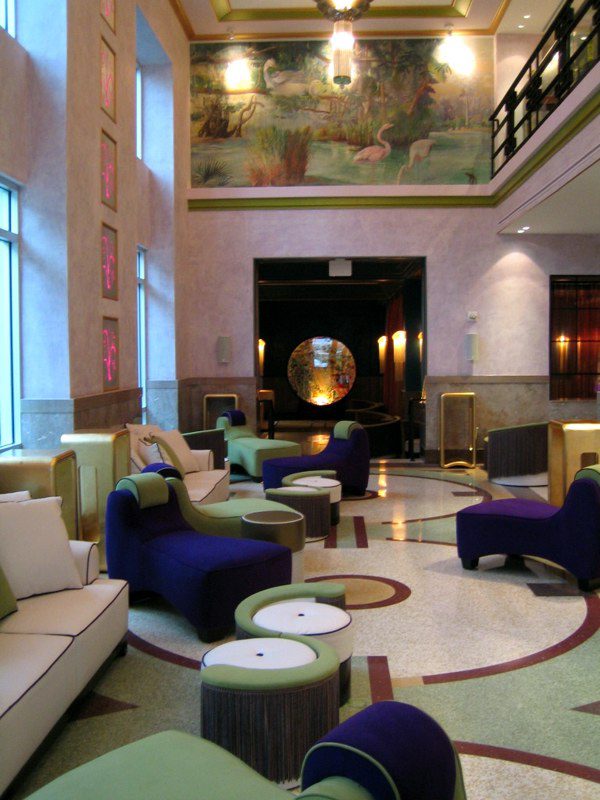 Modern hotel lobby with stylish seating and elegant decor.