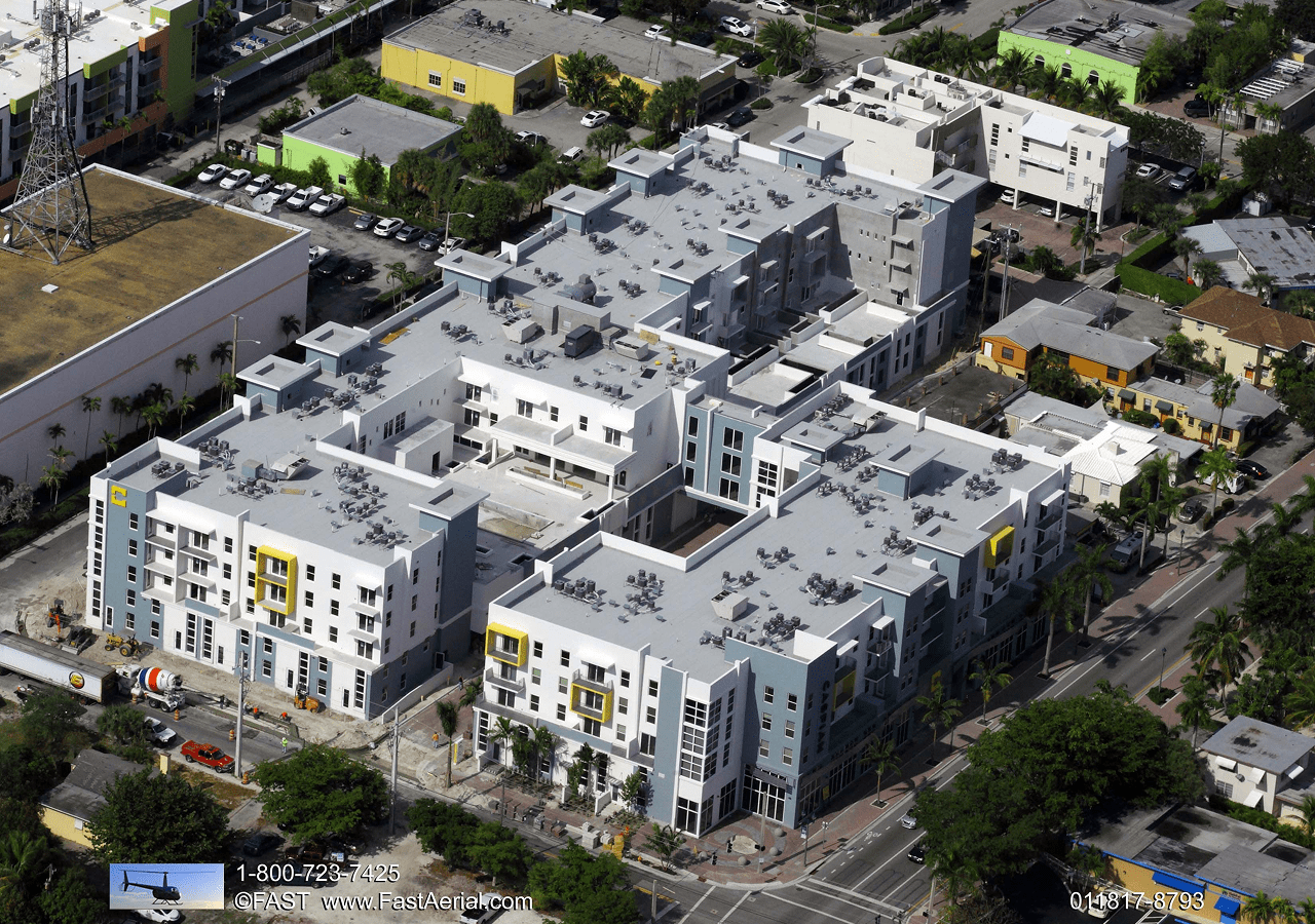 Aerial view of a modern apartment complex in an urban area.