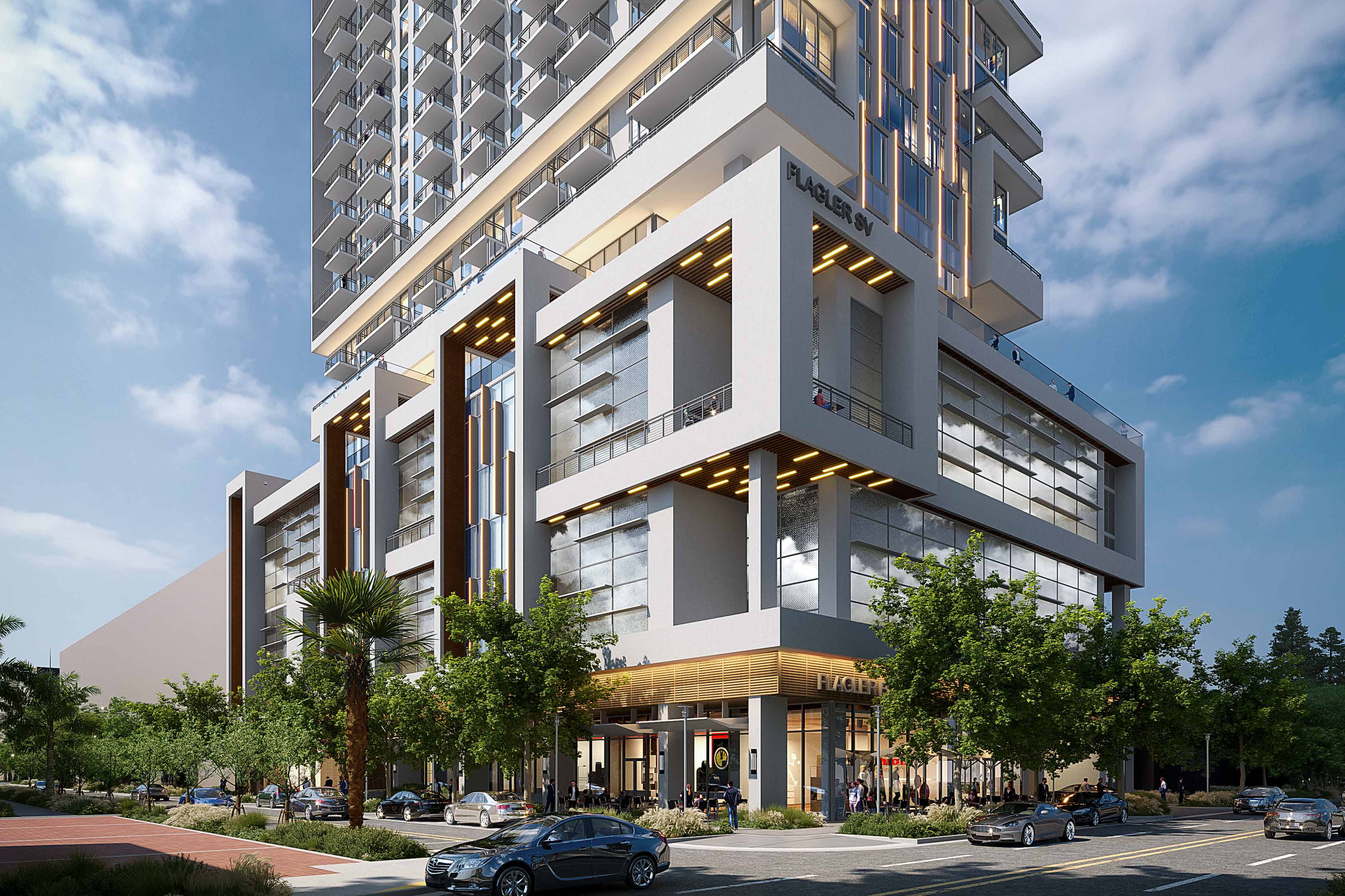 Modern mixed-use building with retail and residential spaces under a clear sky.